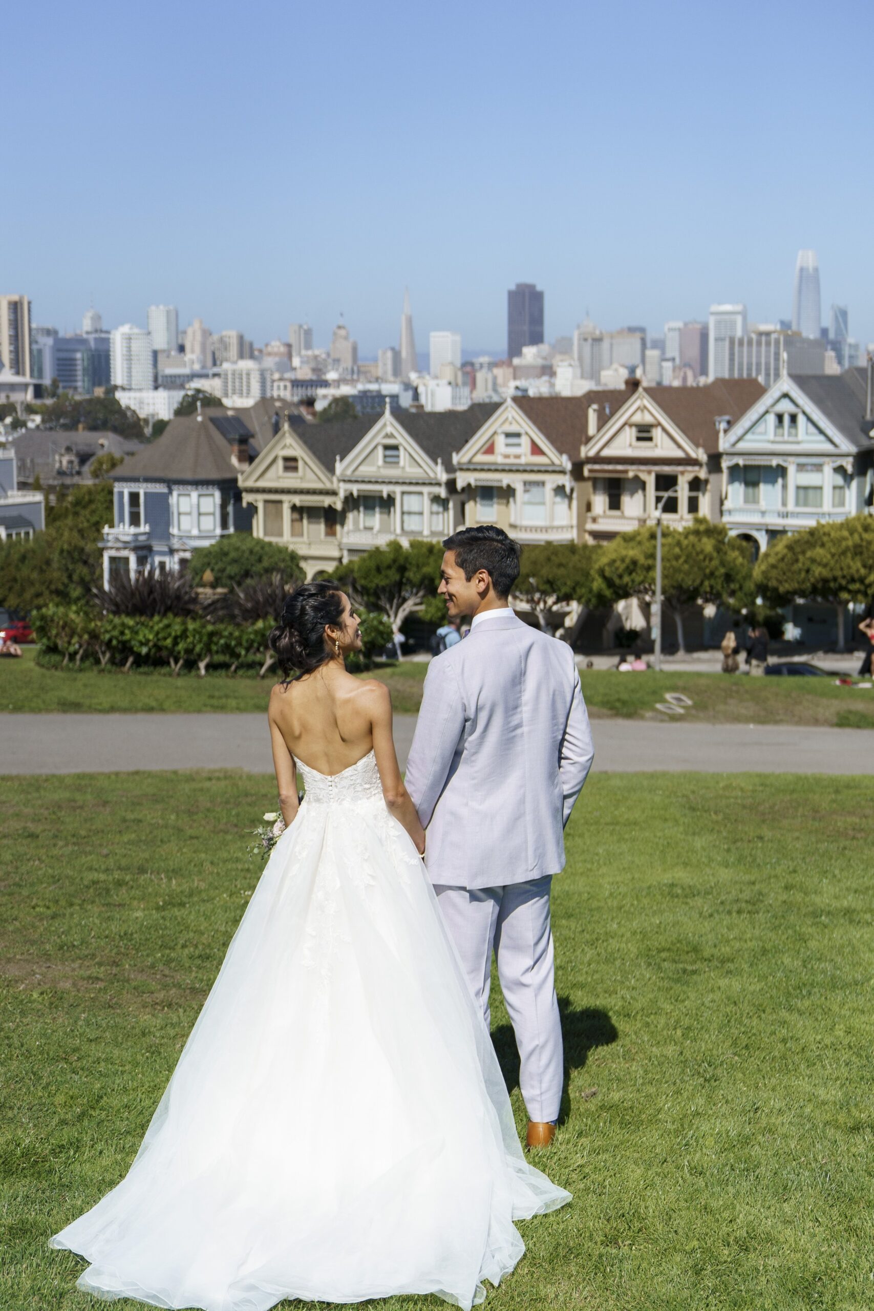 Couple over looking their old neighborhood after their wedding at San Francisco City Hall