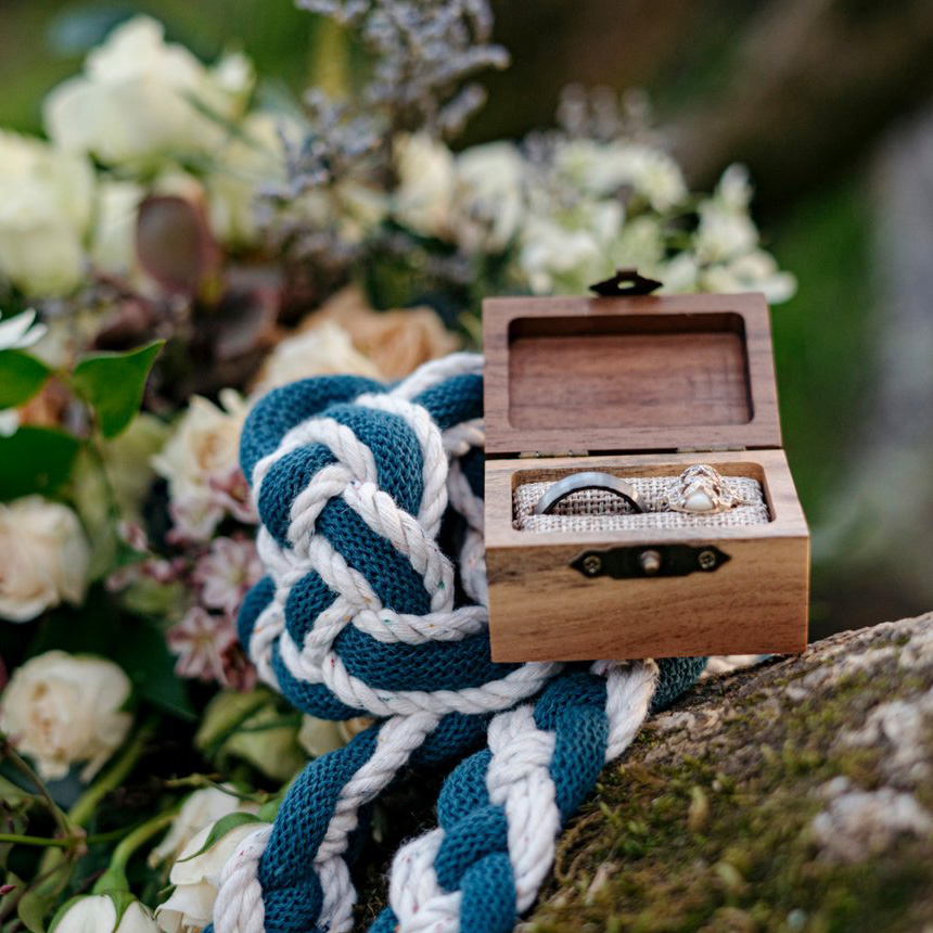 Photography of a Celtic Handfasting Cord and Wedding Rings